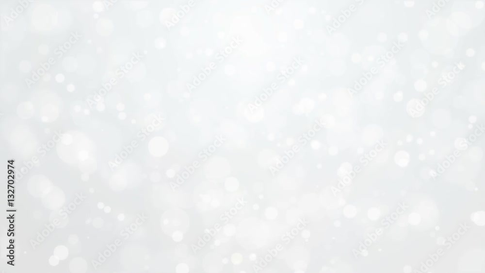 Beautiful glowing silver white bokeh background with flickering light particles.
