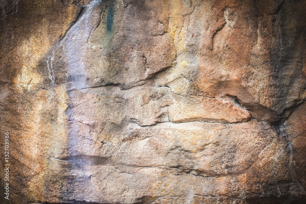 Naklejka premium texture and abstract background a large rock wall. decorate the park.