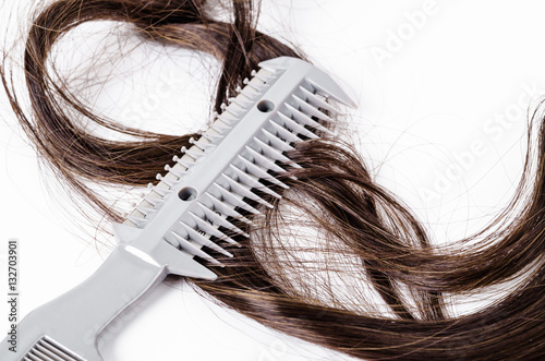 Comb slice hair with blade and hairs. photo