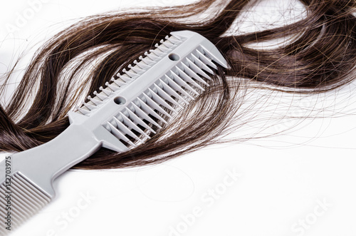 Comb slice hair with blade and hairs.