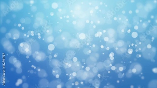 Beautiful blue animated background with floating glowing bokeh lights.