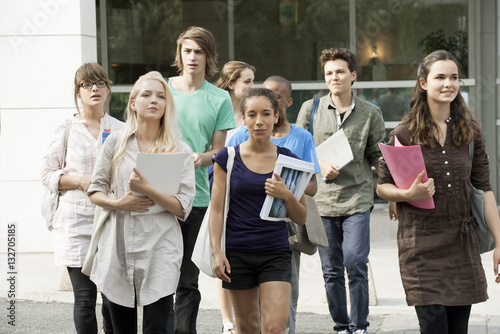 University students walking on campus photo