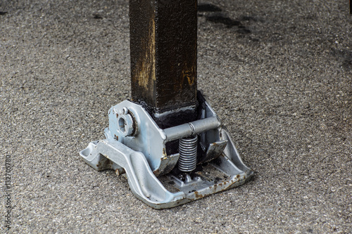 Fotografie Extended side hydraulic outrigger to increase crane stability until is under heavy duty