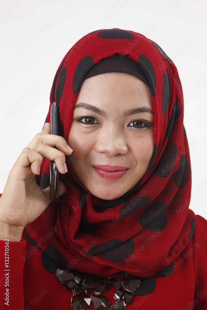 malay woman talking with smart phone