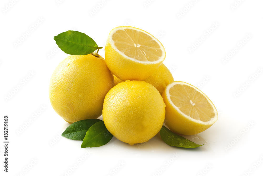Naklejka Ripe juicy lemon with a leaf isolated on white