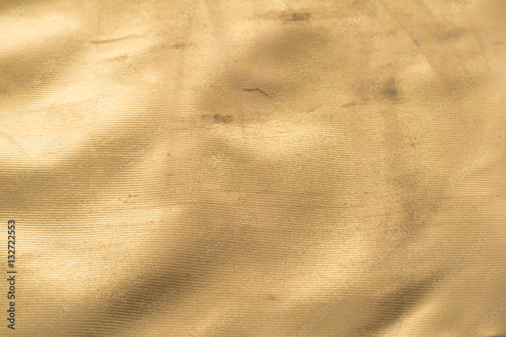 Gold texture with bumps, scuffs and scratches Golden background Gold texture with bumps, scuffs and scratches Golden background