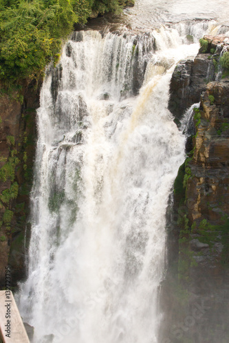 Iguazu (Iguacu) falls, largest series of waterfalls on the planet, located between Brazil, Argentina, and Paraguay with up to 275 separate waterfalls cascading along 2,700 meters (1.6 miles) cliffs.