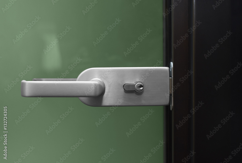 Modern, contemporary satin handle and keyhole detail Modern, contemporary satin handle and keyhole detail