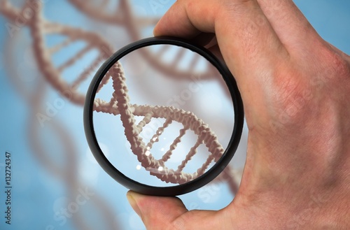 Scientist examinates DNA molecule. Genetics research concept. photo