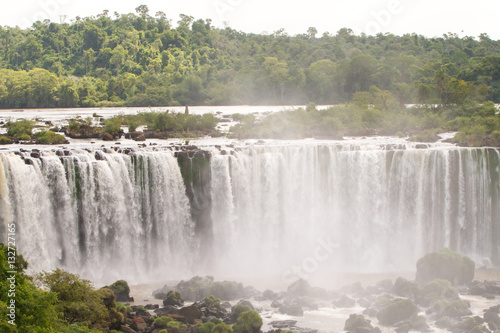 Iguazu  Iguacu  falls  largest series of waterfalls on the planet  located between Brazil  Argentina  and Paraguay with up to 275 separate waterfalls cascading along 2 700 meters  1.6 miles  cliffs.