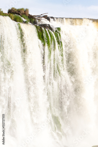 Iguazu (Iguacu) falls, largest series of waterfalls on the planet, located between Brazil, Argentina, and Paraguay with up to 275 separate waterfalls cascading along 2,700 meters (1.6 miles) cliffs.