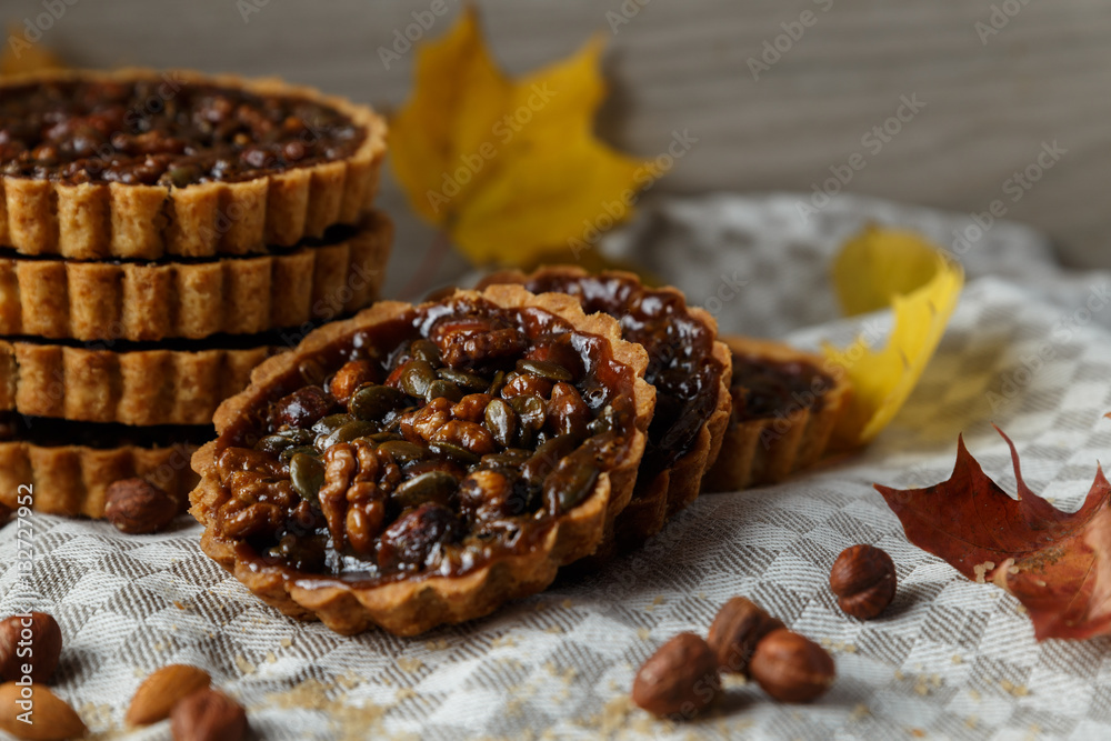 Autumn delicious cakes with nuts on plate. Autumn delicious cakes with nuts on plate.