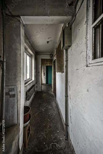 Abandoned grungy corridor in building © Sved Oliver