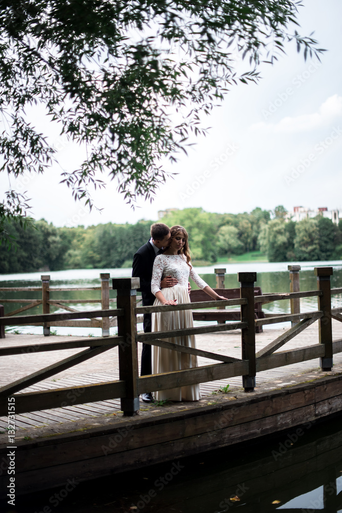 happy bride and groom at a park on their wedding day