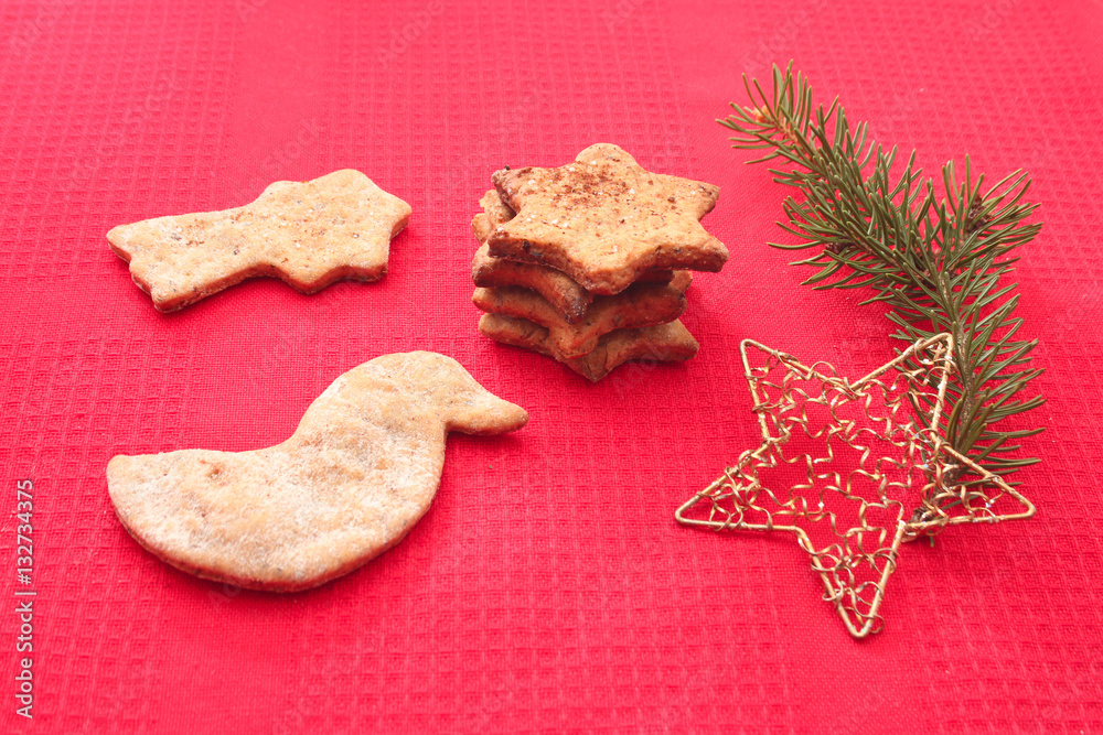 Christmas cookies and decorations on red background Christmas cookies and decorations on red background