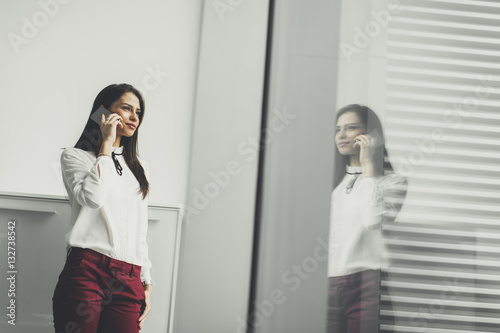 Pretty young woman with mob...