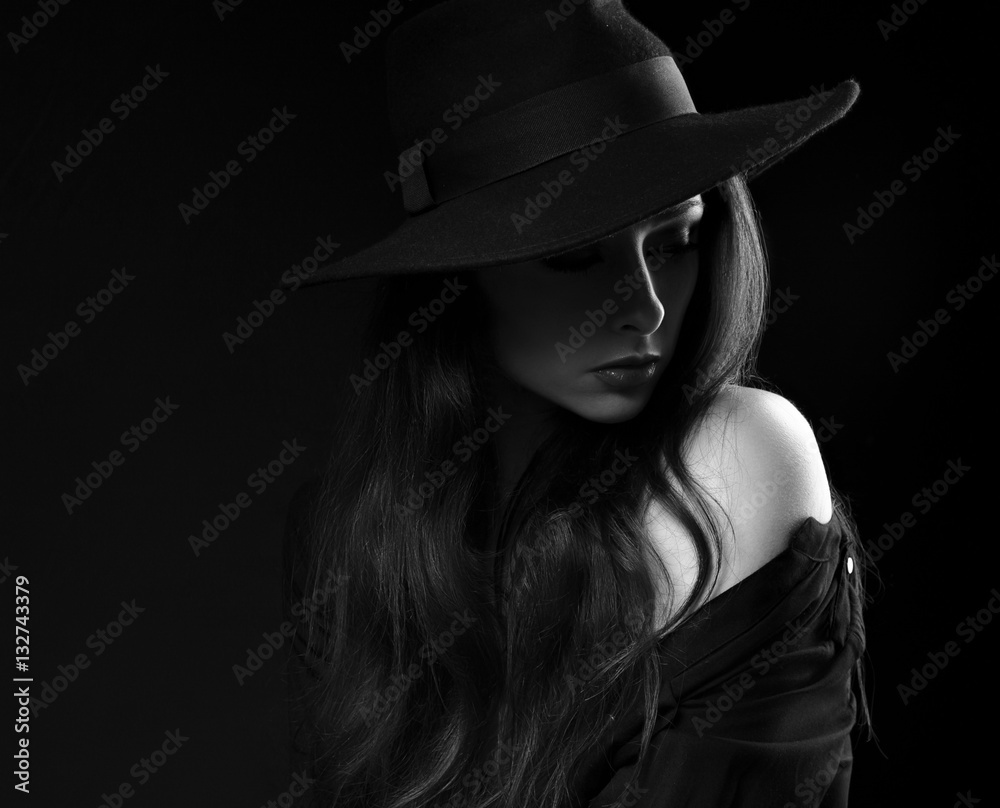 Beautiful long hair woman posing in black shirt and fashion eleg Beautiful long hair woman posing in black shirt and fashion eleg