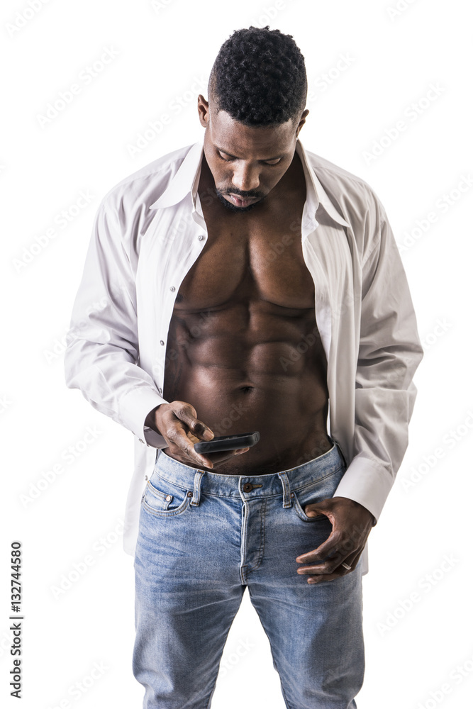 African American bodybuilder man, wearing jeans and open shirt on naked  muscular torso, isolated on white background Stock Photo | Adobe Stock