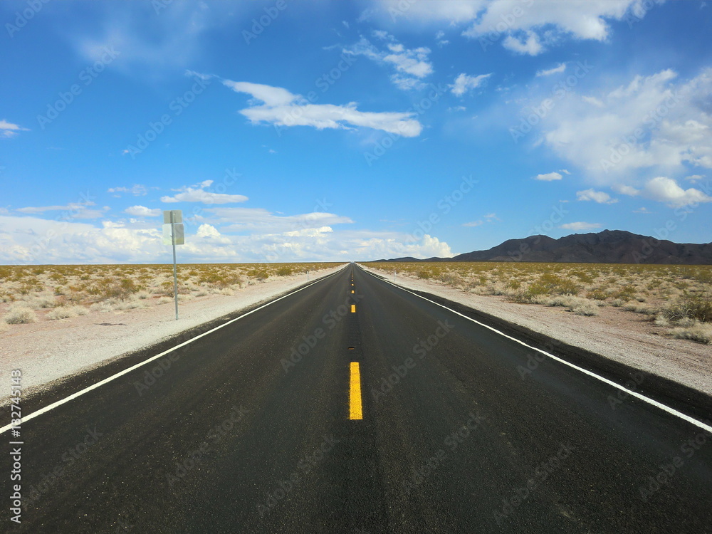 Endless straight desert road
