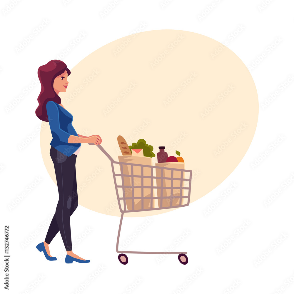 Young pregnant woman pushing shopping cart with grocery products