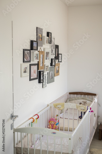 bedroom with photos in various photo frame
