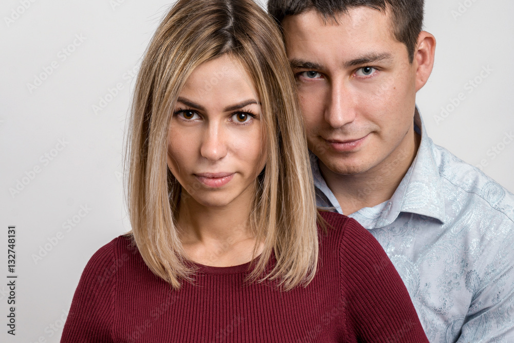 Man and woman. Portrait of a beautiful heterosexual couple. Face closeup Man and woman. Portrait of a beautiful heterosexual couple. Face closeup