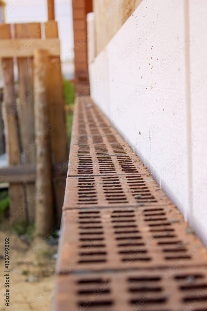 Facing the unfinished brick walls. construction work Facing the unfinished brick walls. construction work