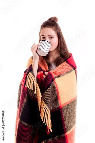 Pretty girl drink coffee from big cup isolated photo