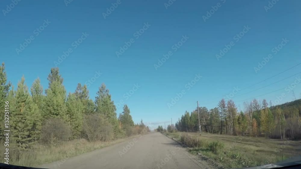 View from Car windshield. Road Trip on Suburban Road View from Car windshield. Road Trip on Suburban Road