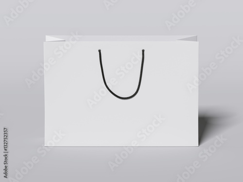 White shopping bag with black handles. 3d rendering