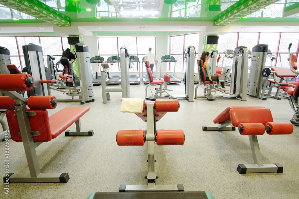Interior of a fitness hall with fitness equipment Interior of a fitness hall with fitness equipment
