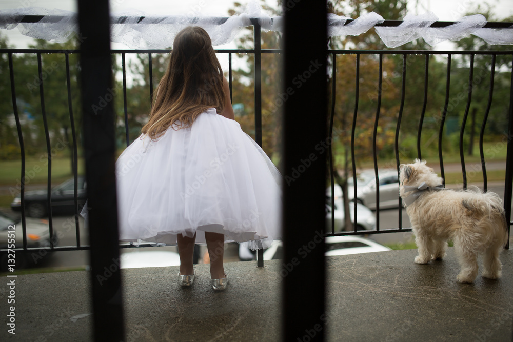 flower girl and a dog