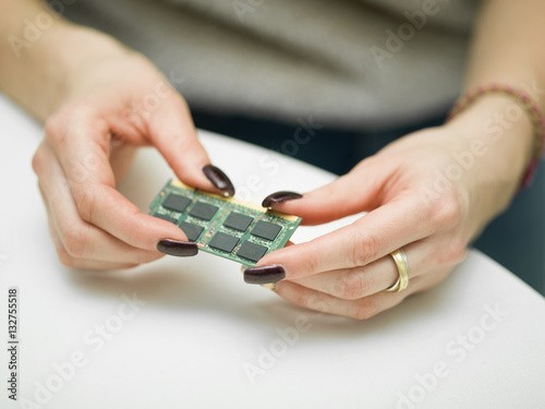 Female Hands With Memory Card © vectorass