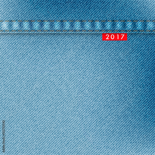 Light blue jeans texture. Denim background with red label and text 2017