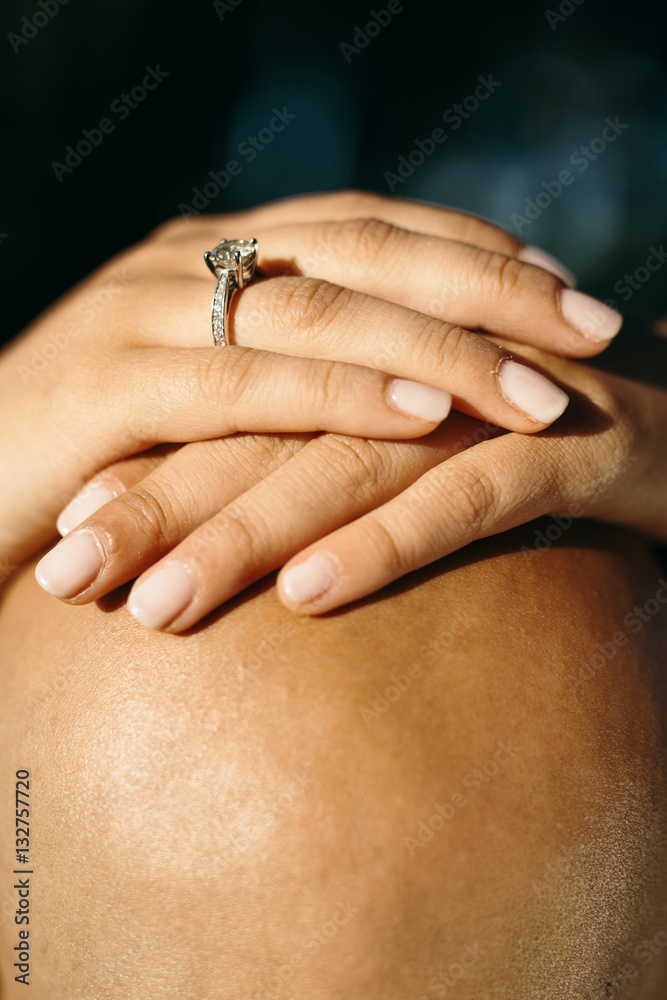wedding ring on bold head