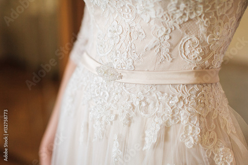 wedding dress of the bride close up.