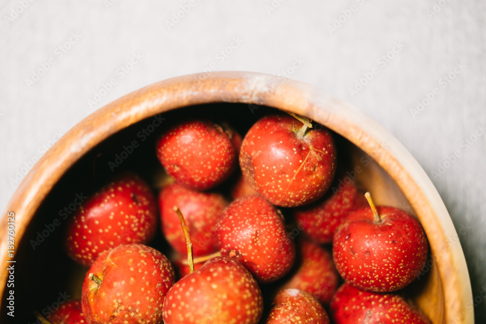 maybush in wooden bowl