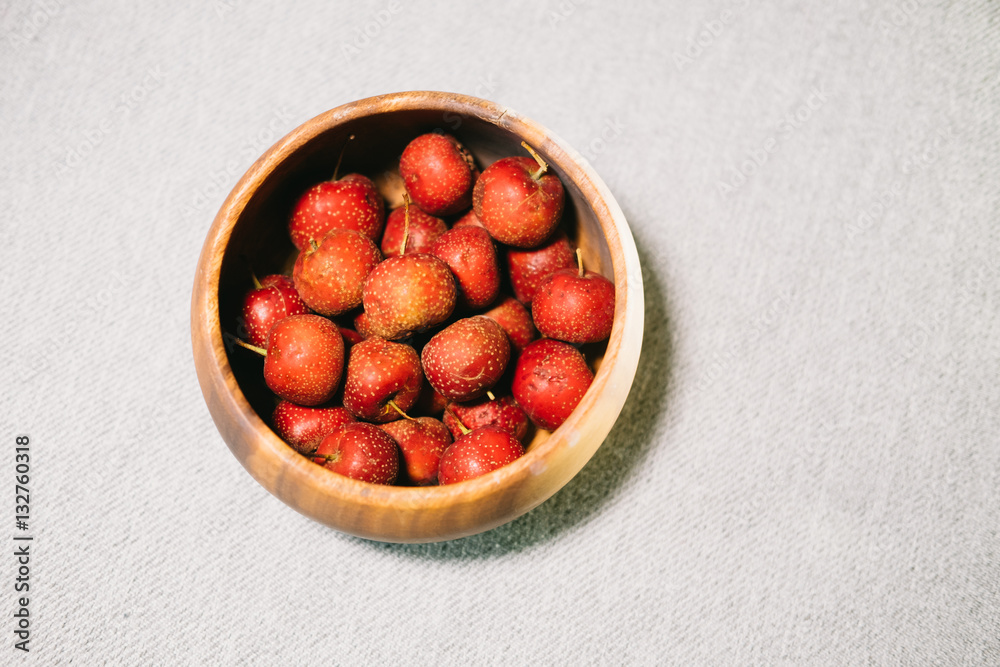 maybush in wooden bowl