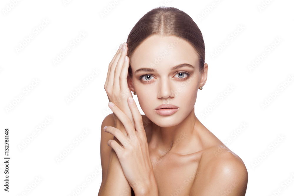 Calm beauty. Portrait of beautiful young blonde woman with nude makeup, blue eyes, hairstyle and clean face. Studio shot, Isolated on white background. Calm beauty. Portrait of beautiful young blonde woman with nude makeup, blue eyes, hairstyle and clean face. Studio shot, Isolated on white background.