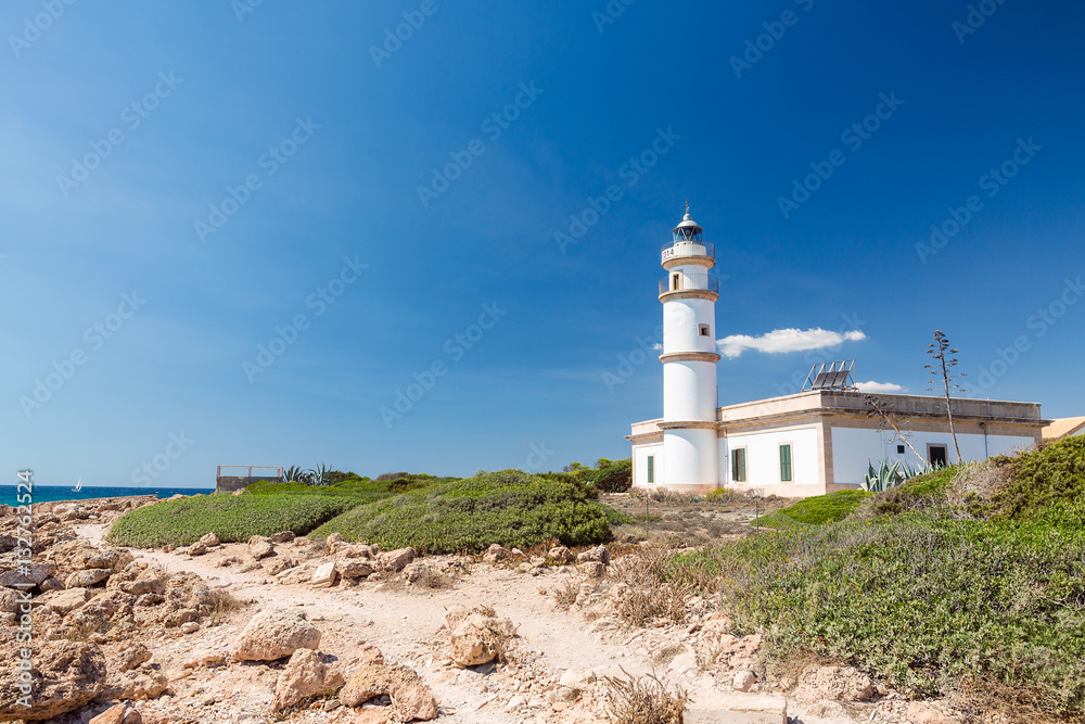 Lighthouse at Cap de Ses Salines. Mallorca island, Spain.This lighthouse is located at the southernmost point of Mallorca.