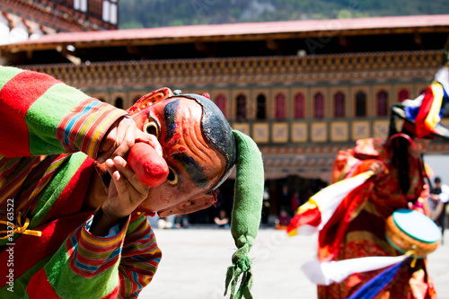 Bhutan clown celebration on a festival in Thimphu with costume and mask wooden phallus fun