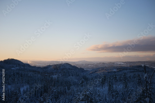 Snow covered landscape in beautiful sunset