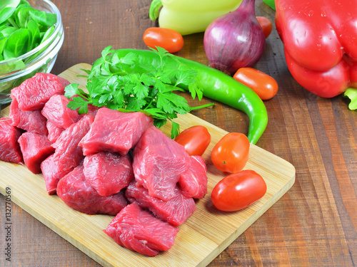Cooking goulash with veal meat and vegetables
