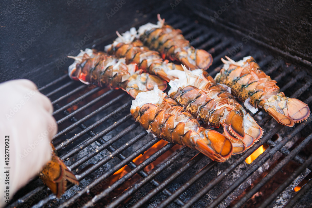 Fresh giant lobsters on a grill. Street food fest