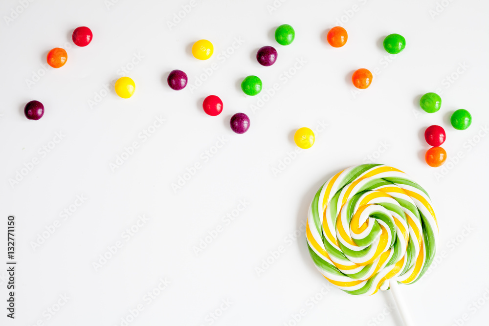 sweets and sugar candies on white background top view sweets and sugar candies on white background top view