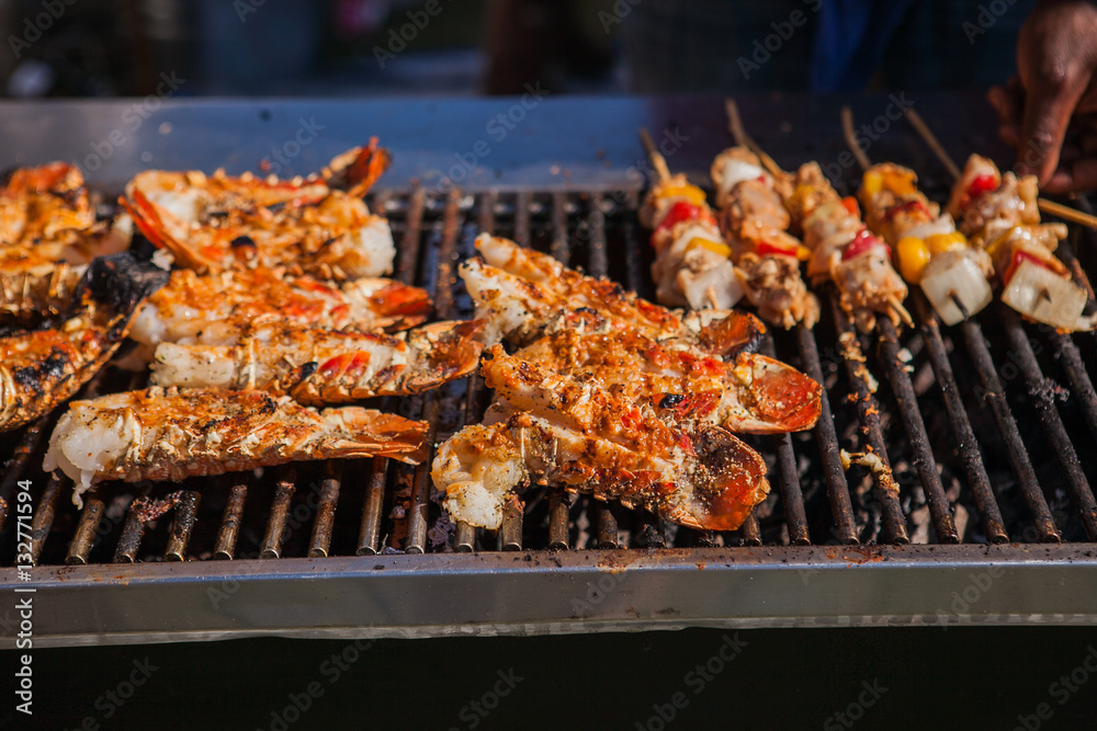 Lobsters on a grill. Lobster street food festival