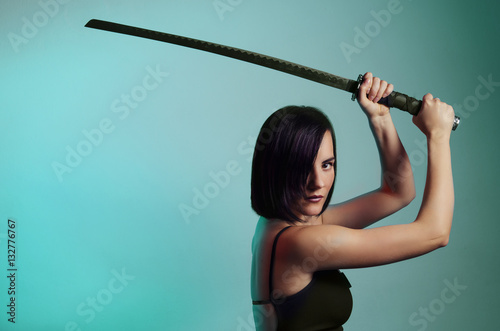 Mystic beautiful black hair girl with sword, copy space