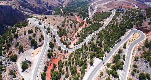 flying above serpentine road photo