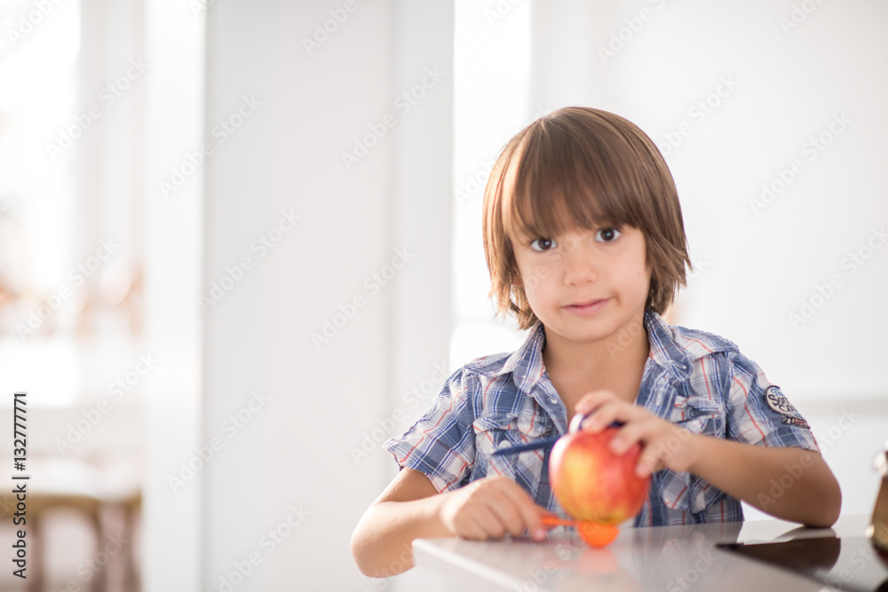 Fototapeta premium Cute adorable little boy in the kitchen