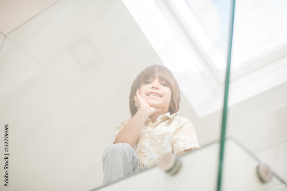 Cheerful kid at his room in new house Cheerful kid at his room in new house